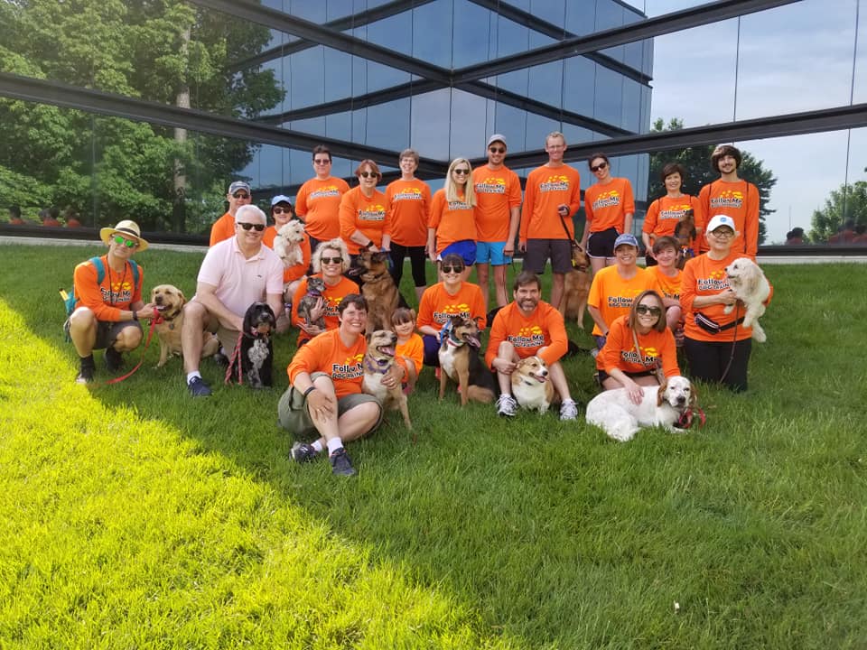 A group of people in matching custom team shirts