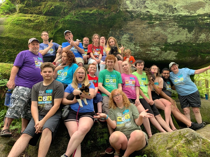 The Romouw Family wearing their custom family reunion shirts