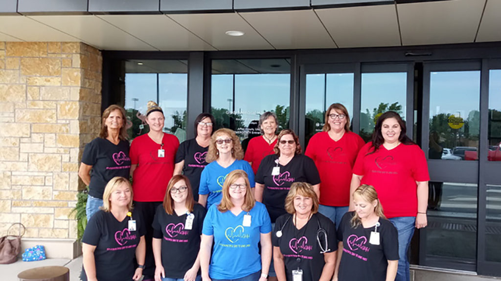 The Five Oaks Medical Group in their matching shirts