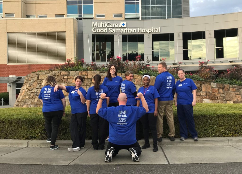 The MultiCare Good Samaritan supply chain employees in their custom shirts