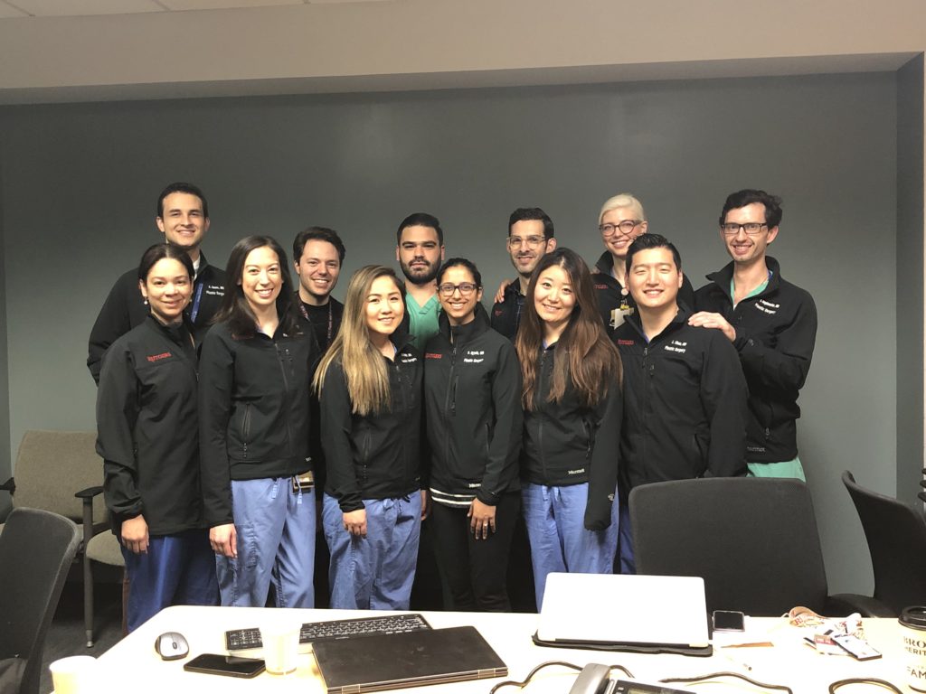 Plastic Surgery residents at Rutgers University in their Match Day jackets