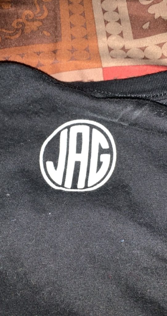 Jacob's trademark monogram logo printed on the back of all his custom gear