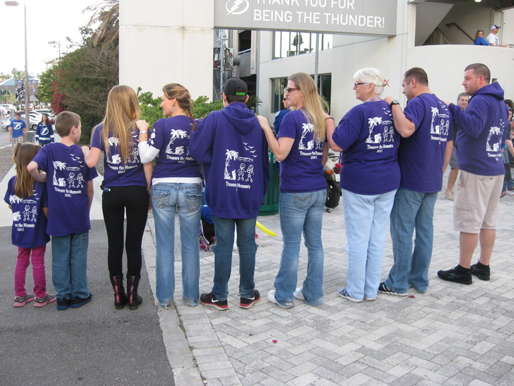 Group wearing matching shirts for Overdose Awareness