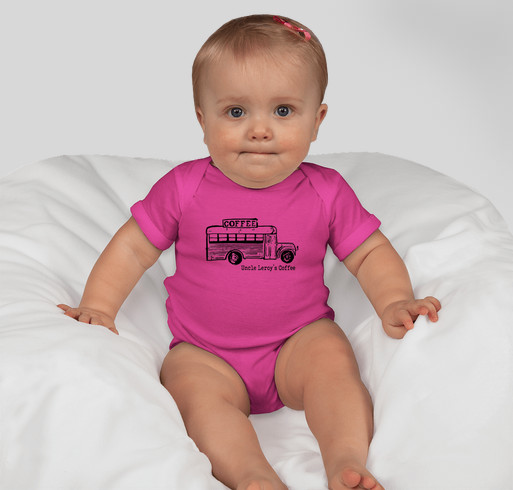 Baby wearing pink onesie with Uncle Leroy's Coffee logo in black ink on front.