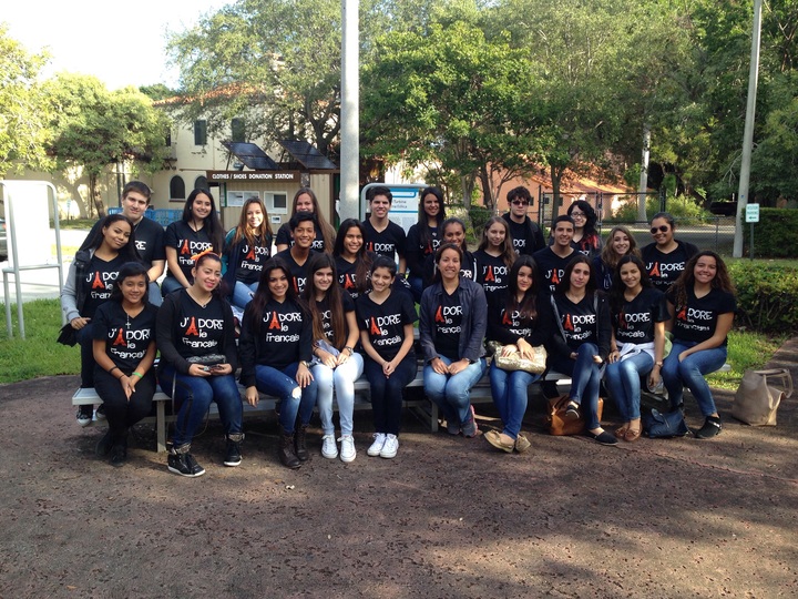 French club students wearing matching shirts 