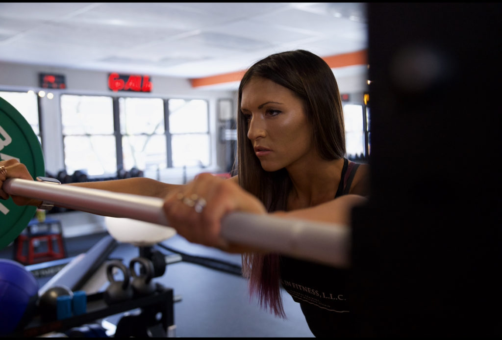 Woman lifting a barbell