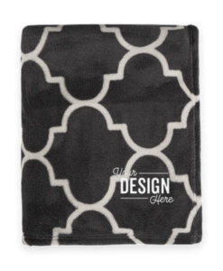 A velvety soft Port Authority Plush Blanket in a Graphite Grey Quatrefoil pattern makes the perfect corporate gift!