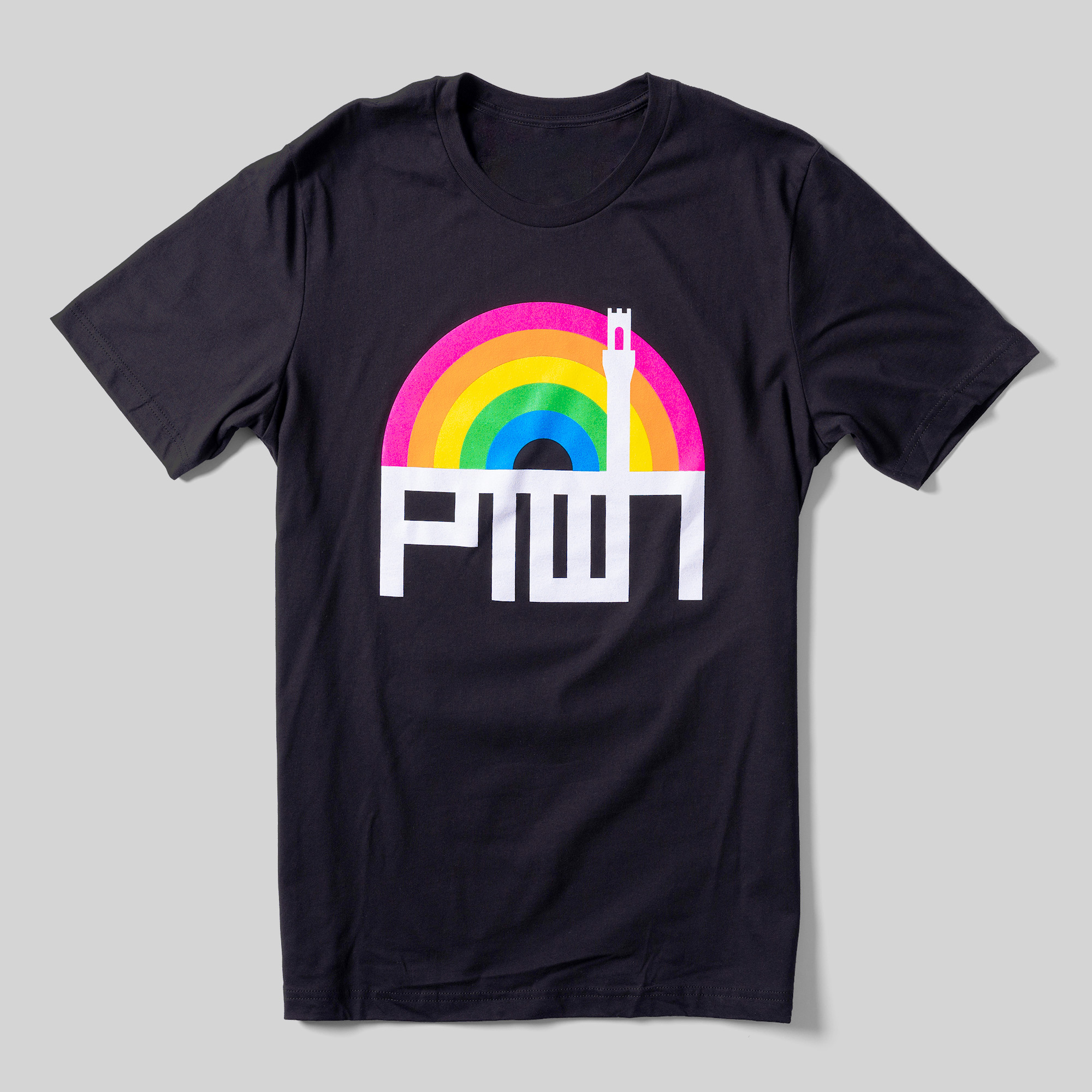 A folded black t-shirt with a rainbow and "PTWN" beneath it.