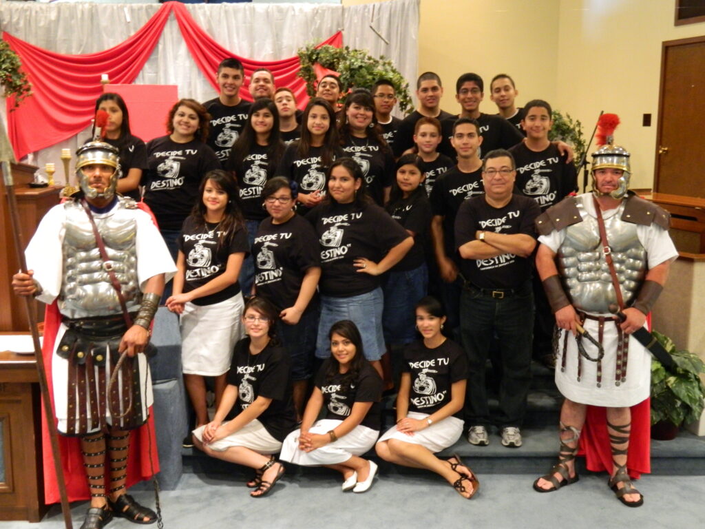 A group of people wearing their custom t-shirts. 