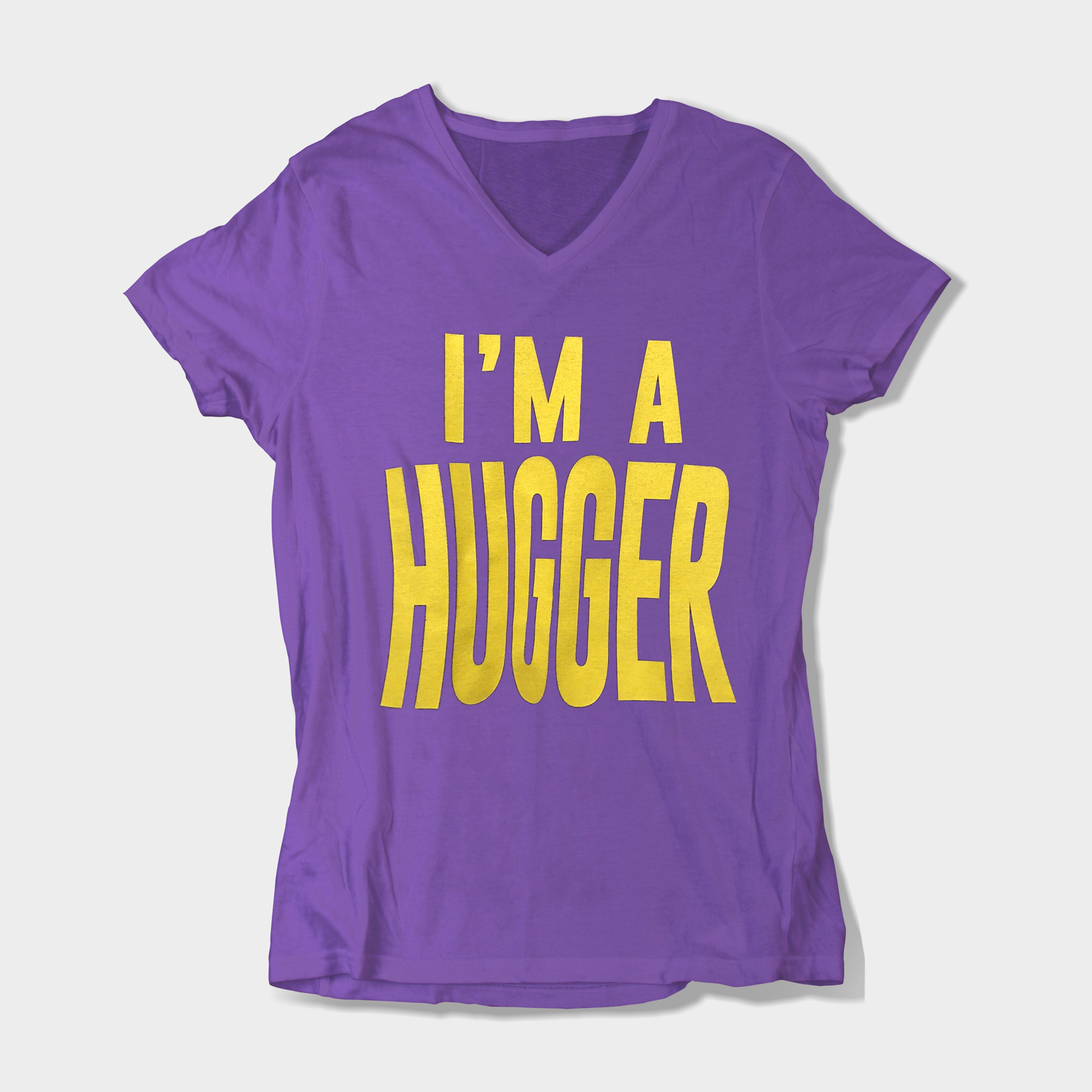 Bayley's purple "I'm a Hugger" t-shirt features bold yellow lettering that gets thinner in the middle of the design, mimicking being hugged. 